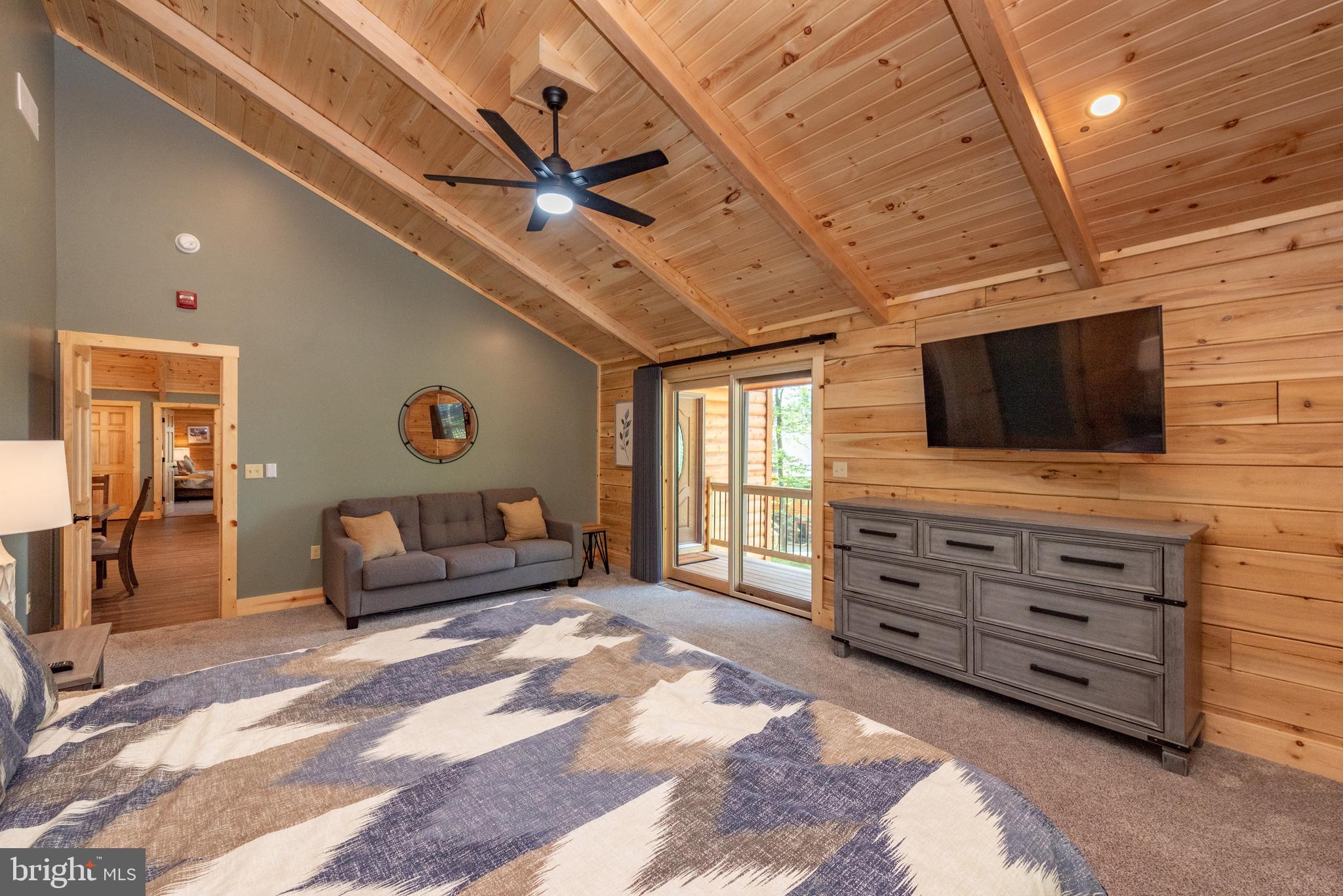 110 Wisp Adventure Road McHenry, MD 21541 - Photo 20 of 73 a living room with furniture and a flat screen tv