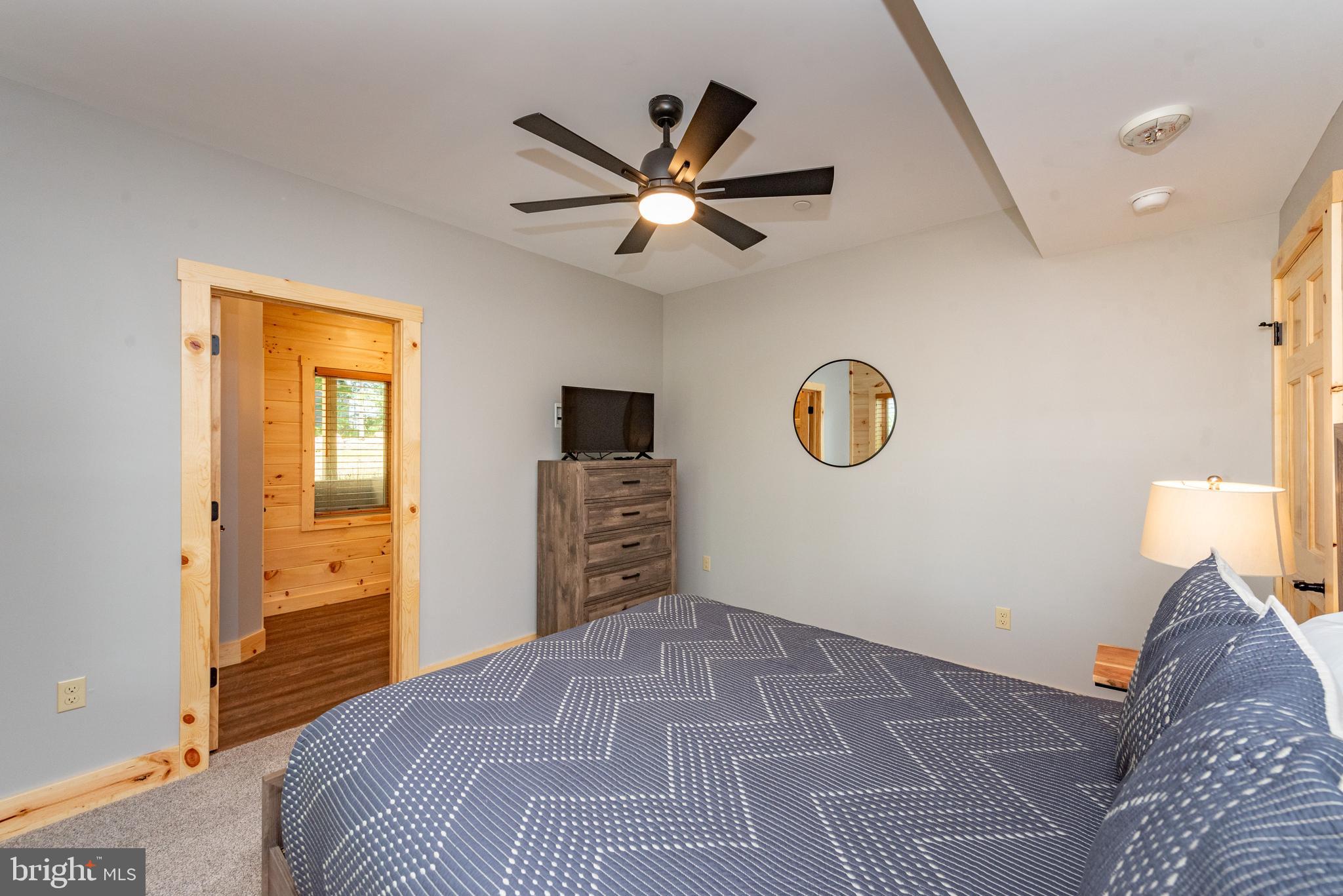 110 Wisp Adventure Road McHenry, MD 21541 - Photo 47 of 73 a bedroom with a bed and a window