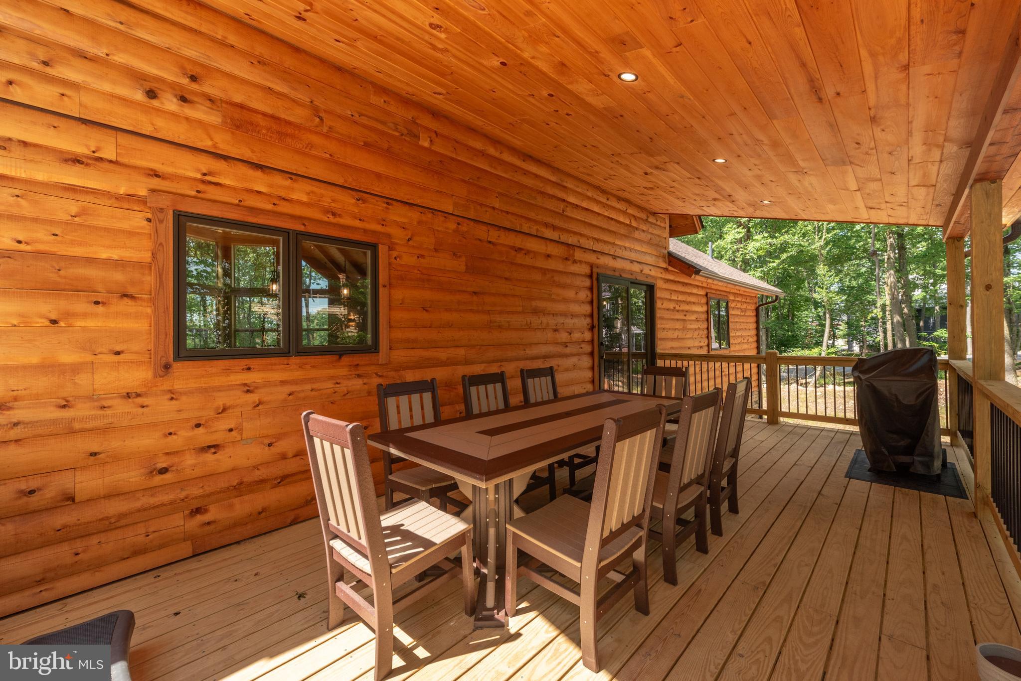 110 Wisp Adventure Road McHenry, MD 21541 - Photo 68 of 73 a view of a patio with wooden floor