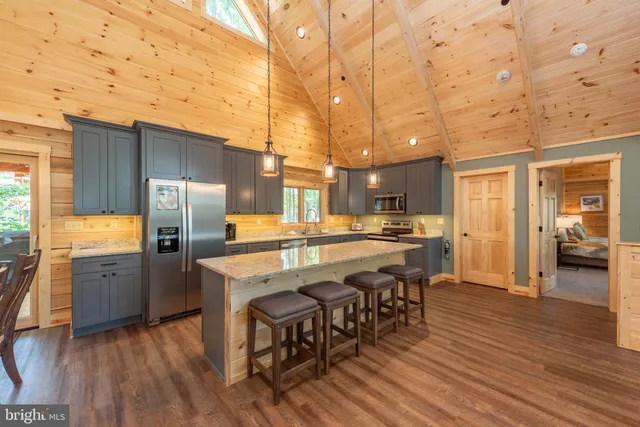 a bathroom with a bathtub and window