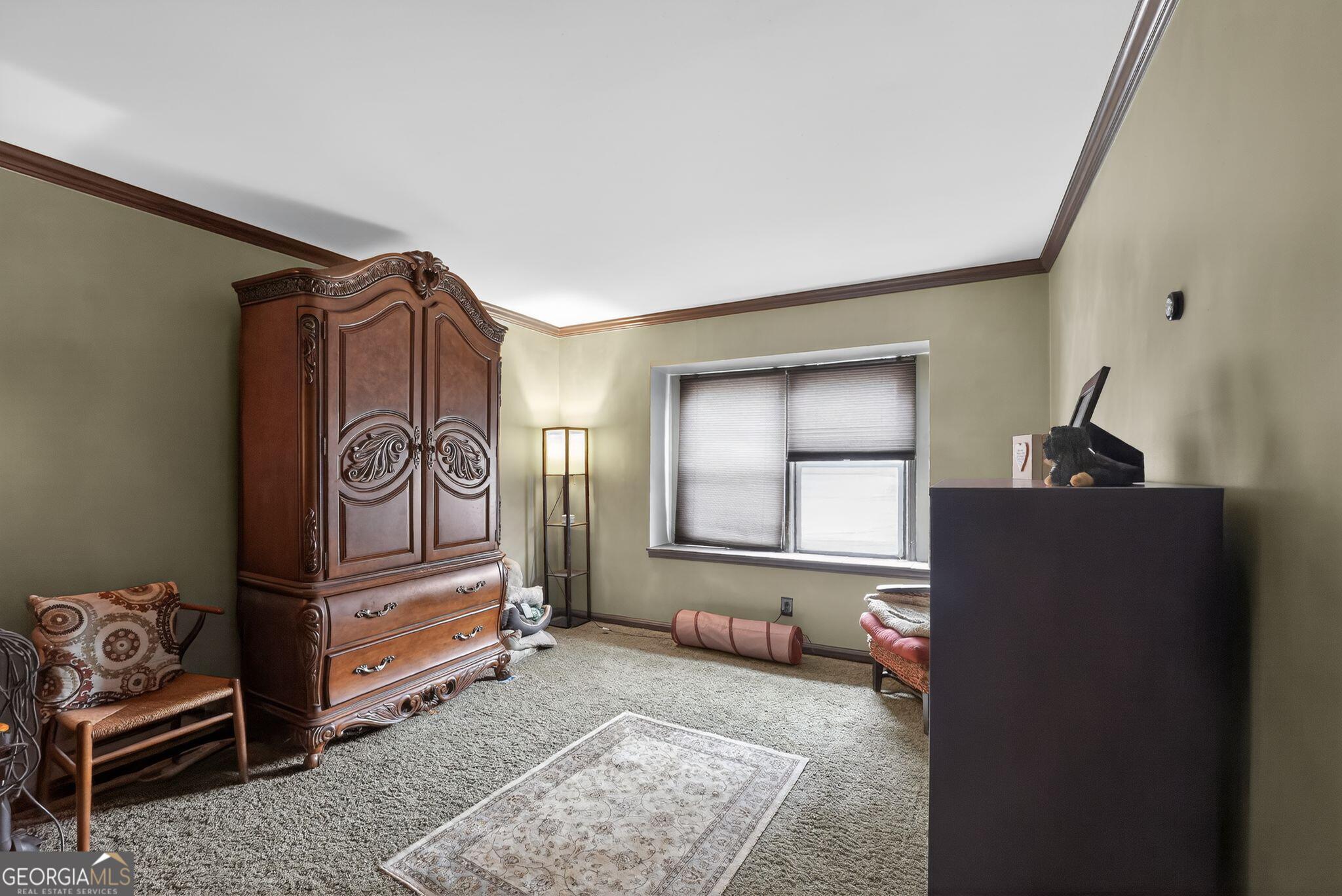 68 Montre Square Northwest Atlanta, GA 30327 - Photo 12 of 16 a living room with furniture and a gate
