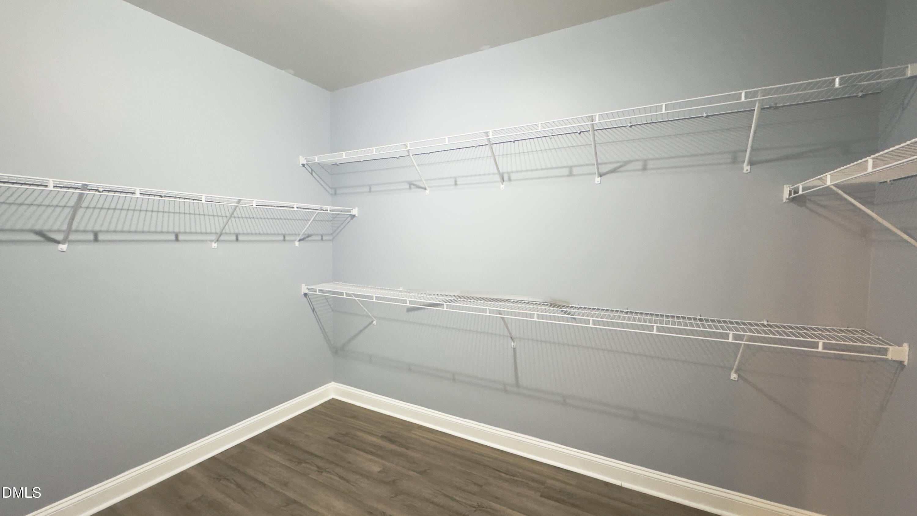 5401 Razan Street Raleigh, NC 27616 - Photo 18 of 30 a view of a room with racks on the wall