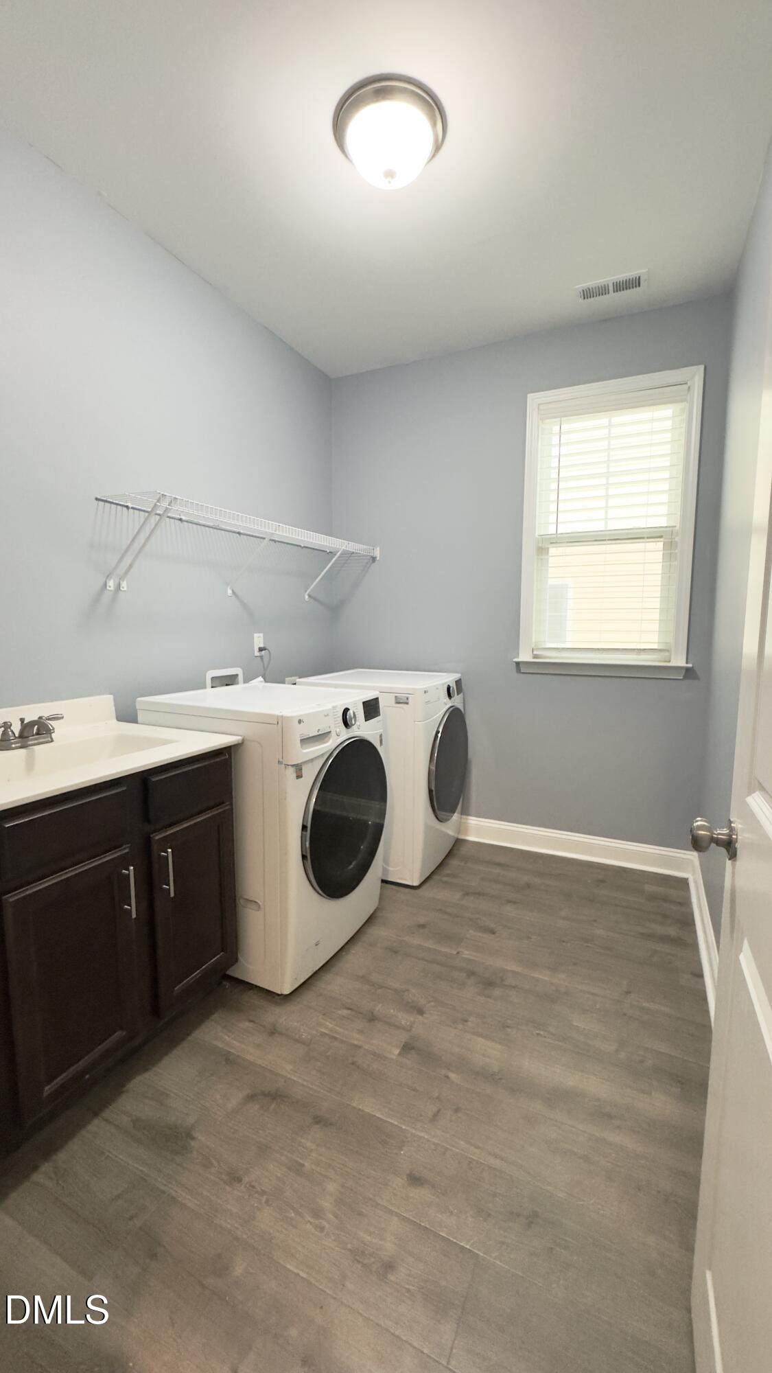 5401 Razan Street Raleigh, NC 27616 - Photo 28 of 30 a view of a kitchen with a stove top oven