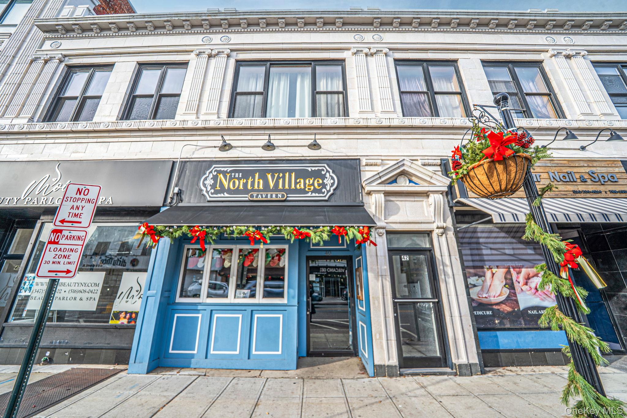 a view of street with shops