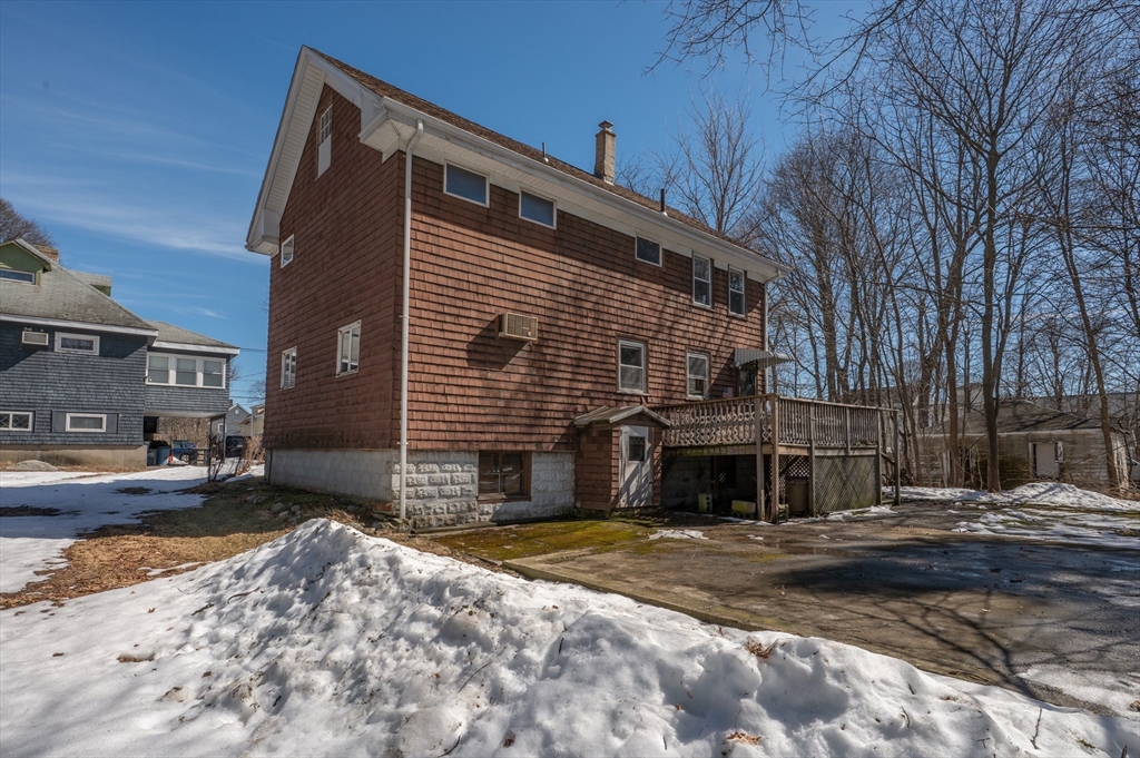 34 Summer Street Saugus, MA 01906 - Photo 4 of 35 a front view of a house with a yard