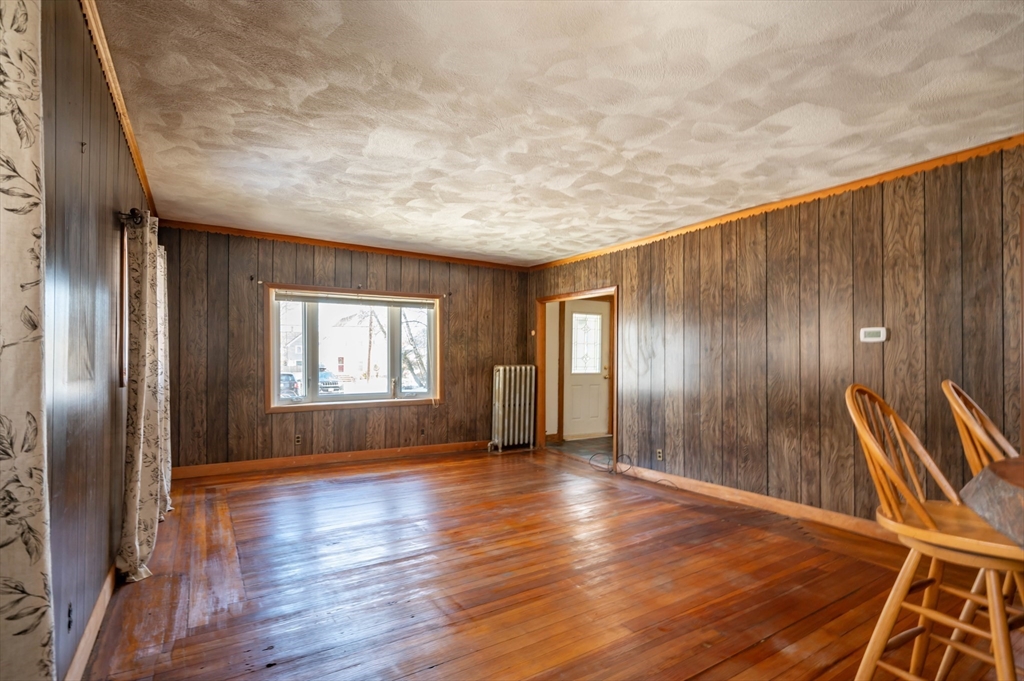 34 Summer Street Saugus, MA 01906 - Photo 10 of 35 an empty room with wooden floor and windows