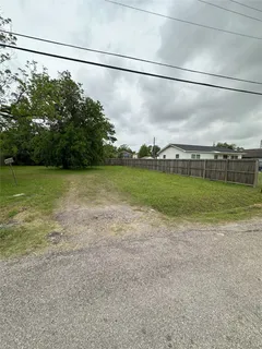 a view of a field with an outdoor space