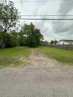 a view of a lake with a big yard