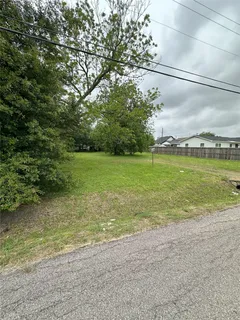 a view of a field with an outdoor space