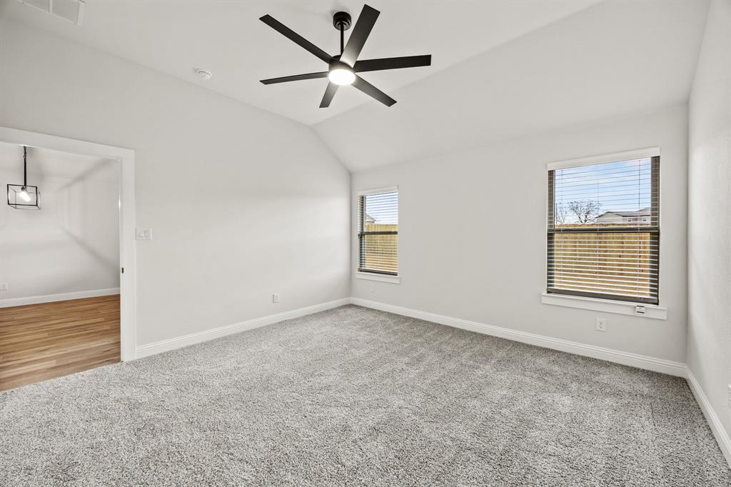 104 Maverick Trail Valley View, TX 76272 - Photo 24 of 30 a view of an empty room with a window