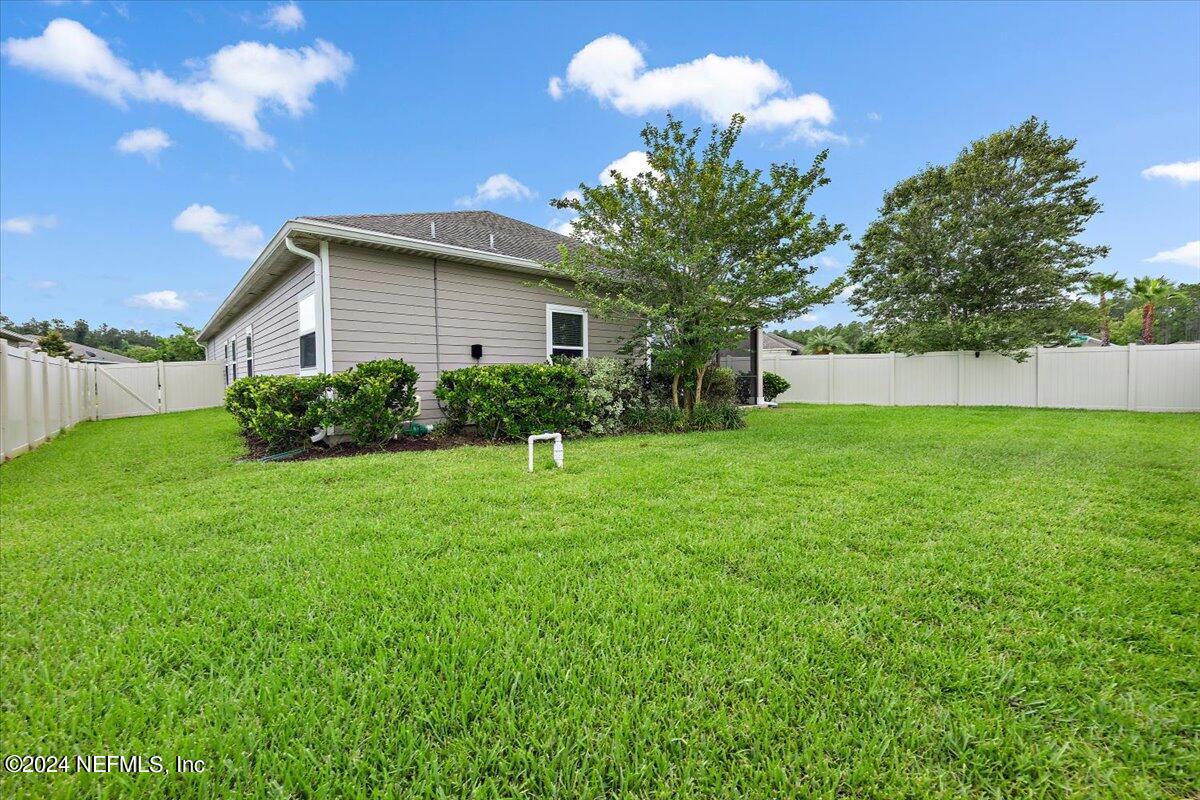 13 Pantano Vista Way St. Augustine, FL 32095 - Photo 5 of 25 a view of a house with a yard