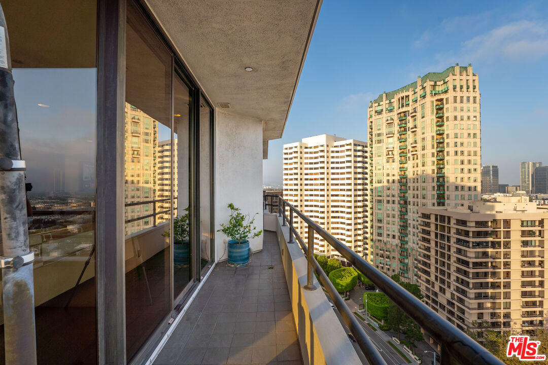 10601 Wilshire Boulevard, Unit 1603 Los Angeles, CA 90024 - Photo 17 of 33 a balcony with a water view