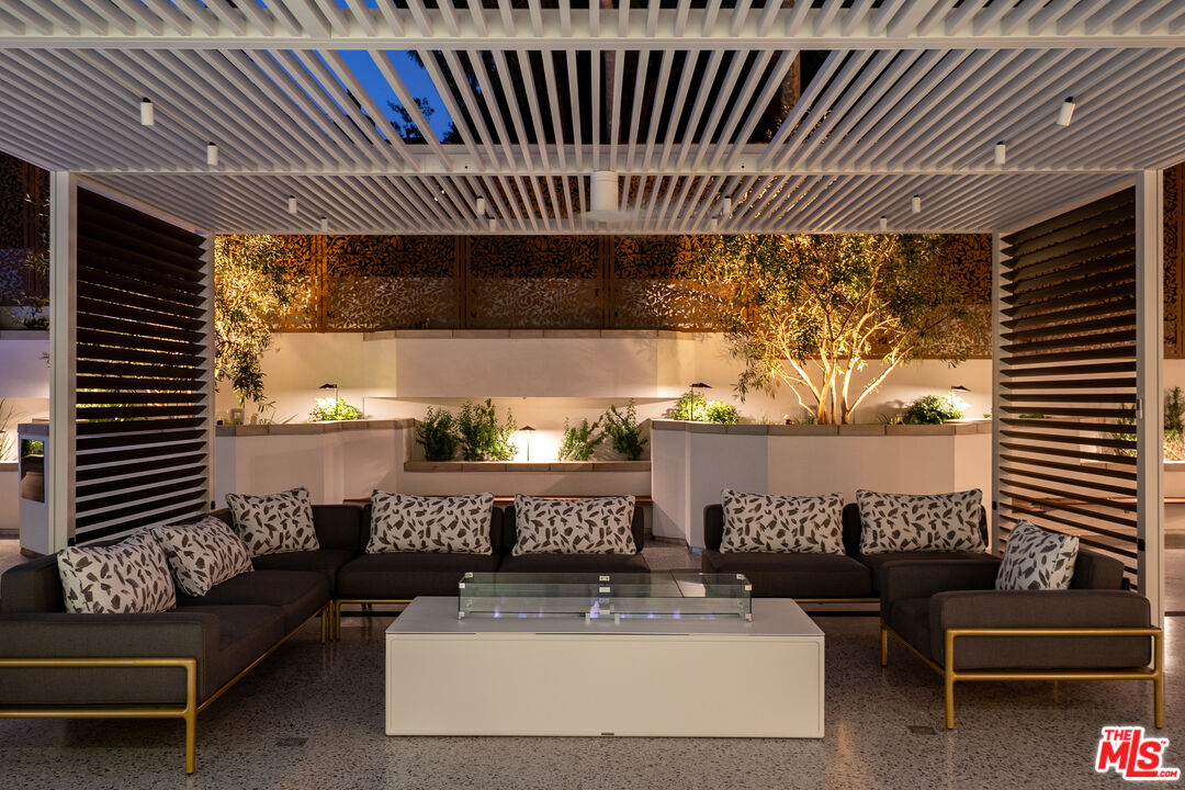 10601 Wilshire Boulevard, Unit 1603 Los Angeles, CA 90024 - Photo 24 of 33 a view of kitchen with furniture and a potted plant