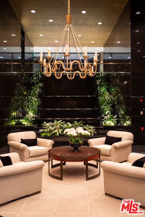 10601 Wilshire Boulevard, Unit 1603 Los Angeles, CA 90024 - Photo 29 of 33 a outdoor living space with furniture and potted plants