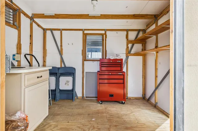 a view of front door with washer and dryer