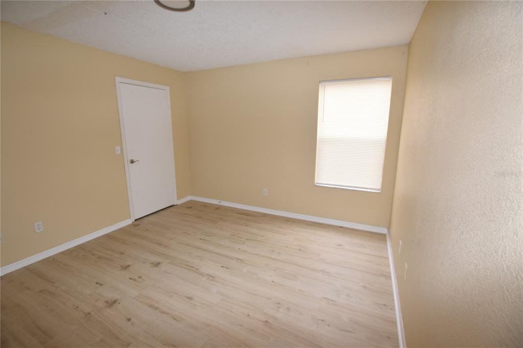 5120 Conroy Road, Unit 511 Orlando, FL 32811 - Photo 14 of 32 an empty room with a window