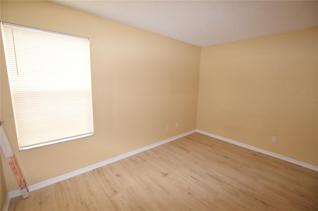 5120 Conroy Road, Unit 511 Orlando, FL 32811 - Photo 17 of 32 an empty room with a window