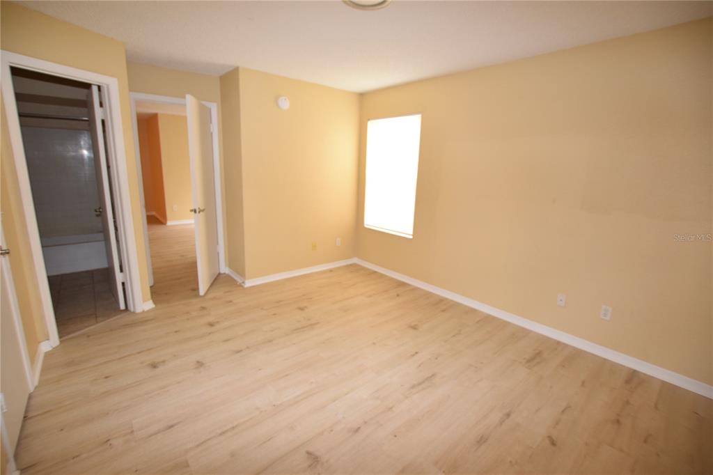 5120 Conroy Road, Unit 511 Orlando, FL 32811 - Photo 19 of 32 an empty room with a natural light