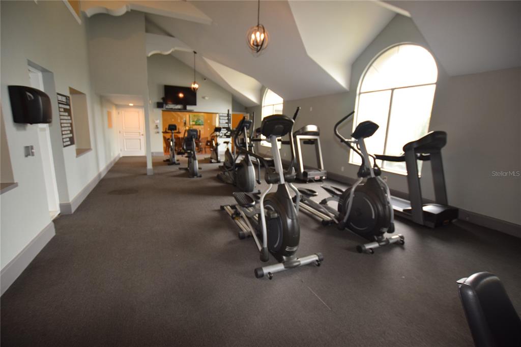 5120 Conroy Road, Unit 511 Orlando, FL 32811 - Photo 23 of 32 a view of a room with gym equipment