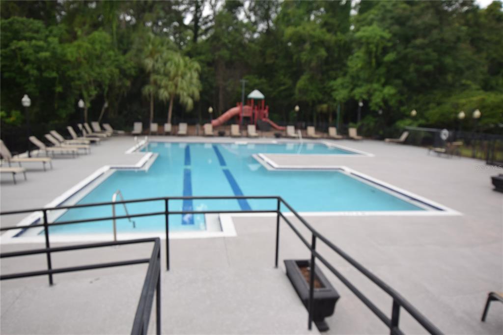 5120 Conroy Road, Unit 511 Orlando, FL 32811 - Photo 31 of 32 a view of a swimming pool with a patio