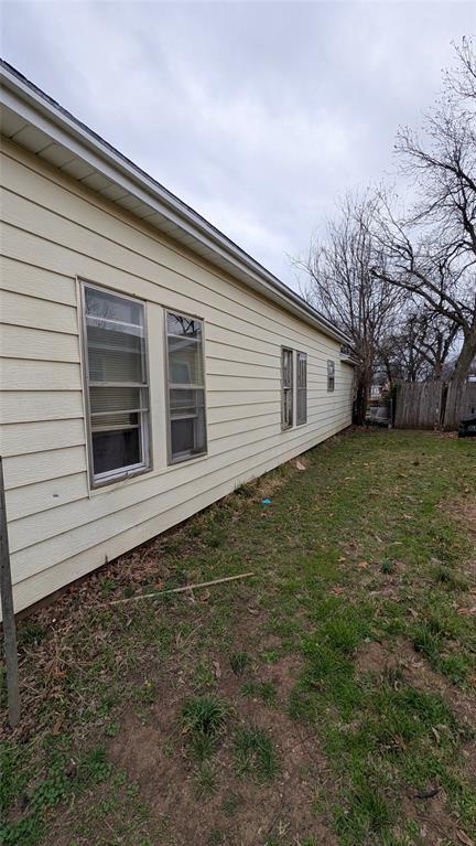405 West Elm Street Olney, TX 76374 - Photo 12 of 13 a backyard of a house