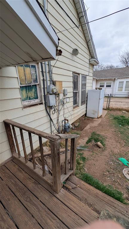405 West Elm Street Olney, TX 76374 - Photo 13 of 13 a view of a house with porch and wooden deck