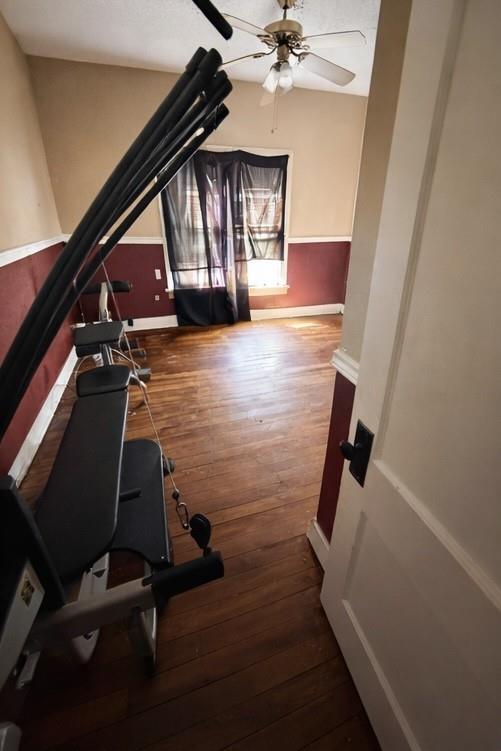 405 West Elm Street Olney, TX 76374 - Photo 6 of 13 a view of room with stairs and wooden floor