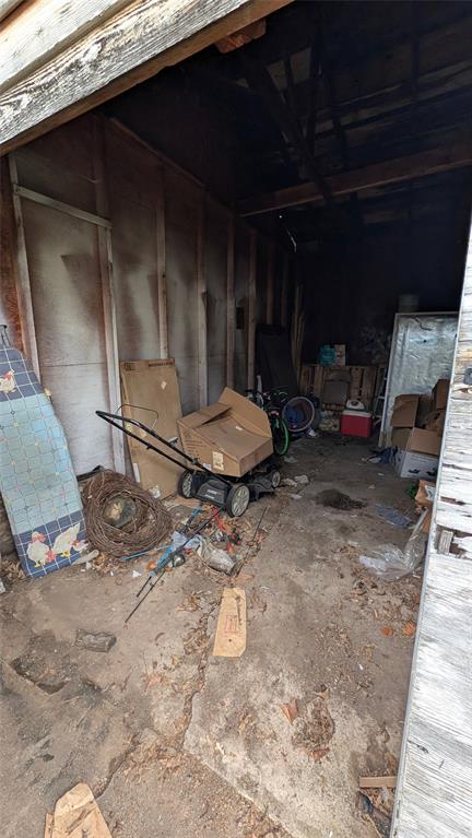 405 West Elm Street Olney, TX 76374 - Photo 10 of 13 a room with water heater and a wooden floors