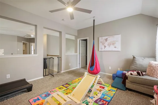a bed room with a bed and a chandelier