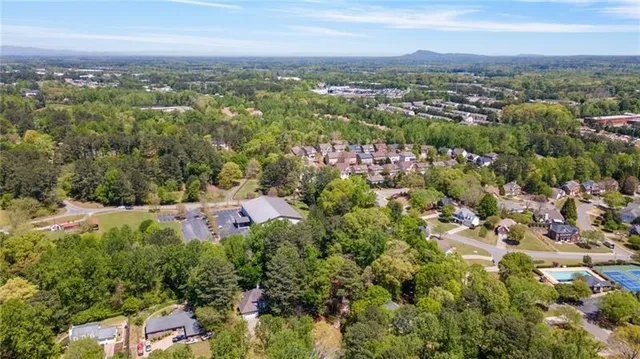 an aerial view of a city with lots of residential buildings