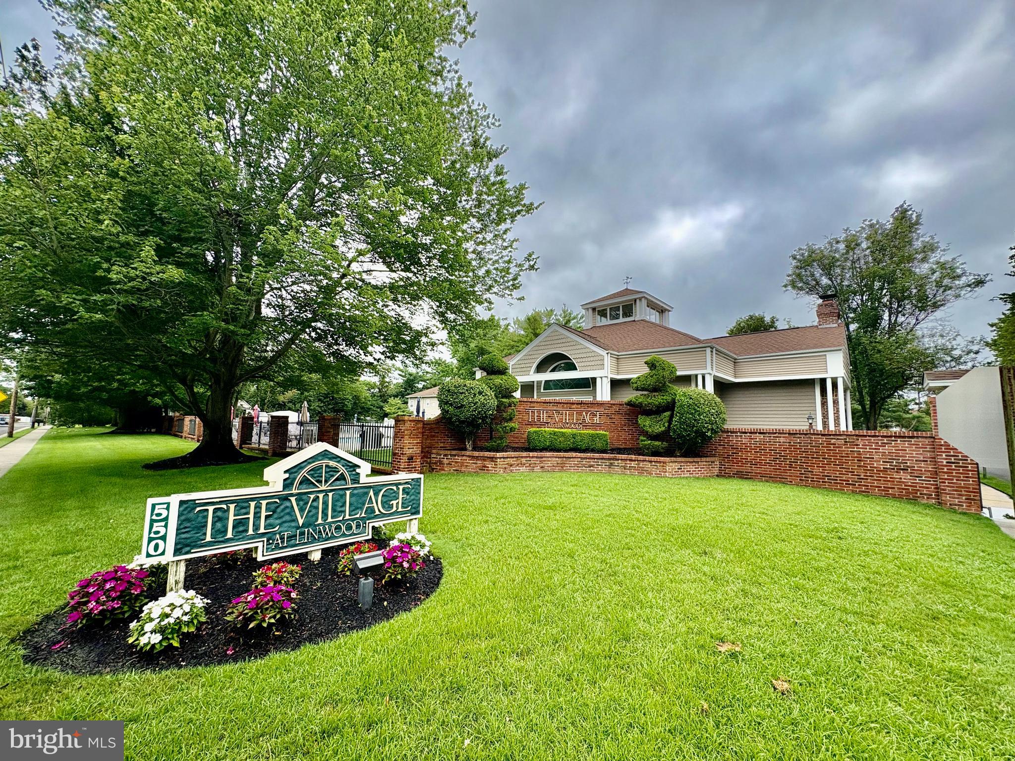 550 Central Avenue Linwood, NJ 08221 - Photo 2 of 13 a front view of a house with garden