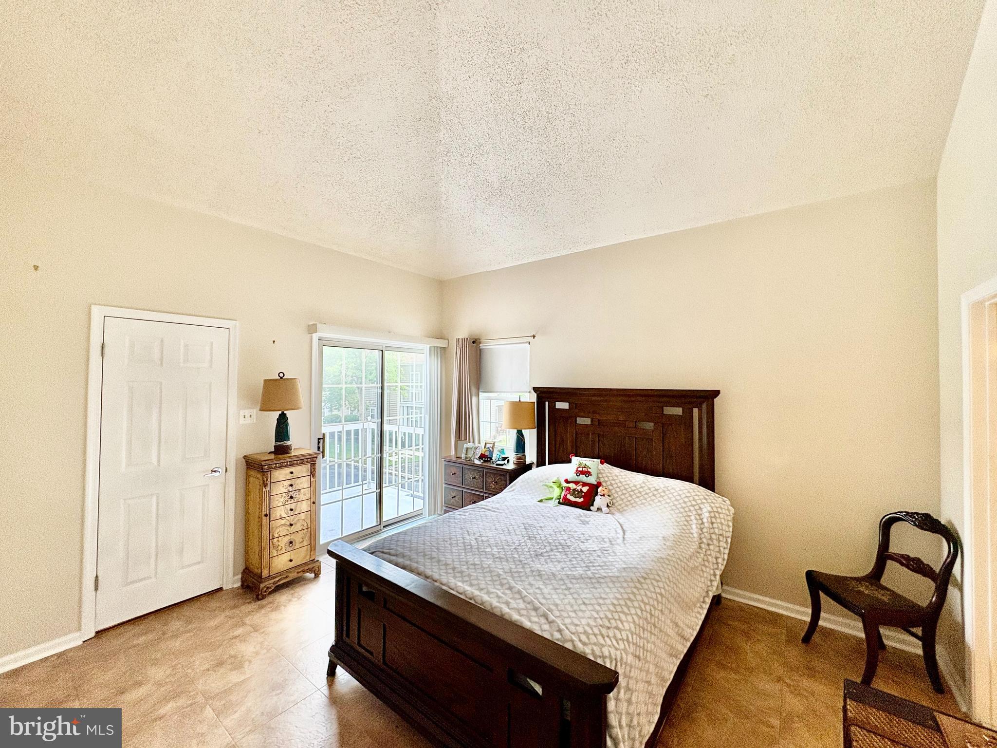 550 Central Avenue Linwood, NJ 08221 - Photo 8 of 13 a bed sitting in a spacious bedroom next to a window