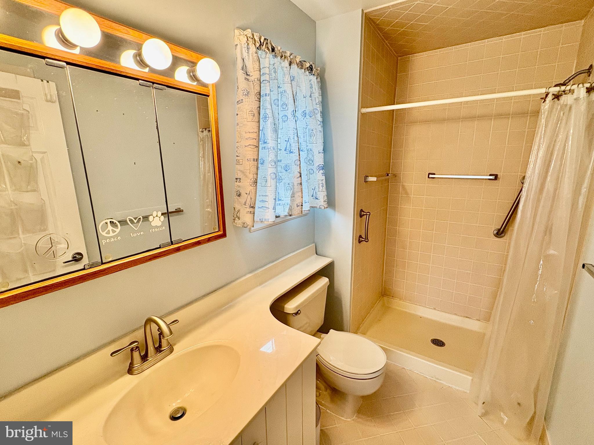 550 Central Avenue Linwood, NJ 08221 - Photo 9 of 13 a bathroom with a sink toilet and shower