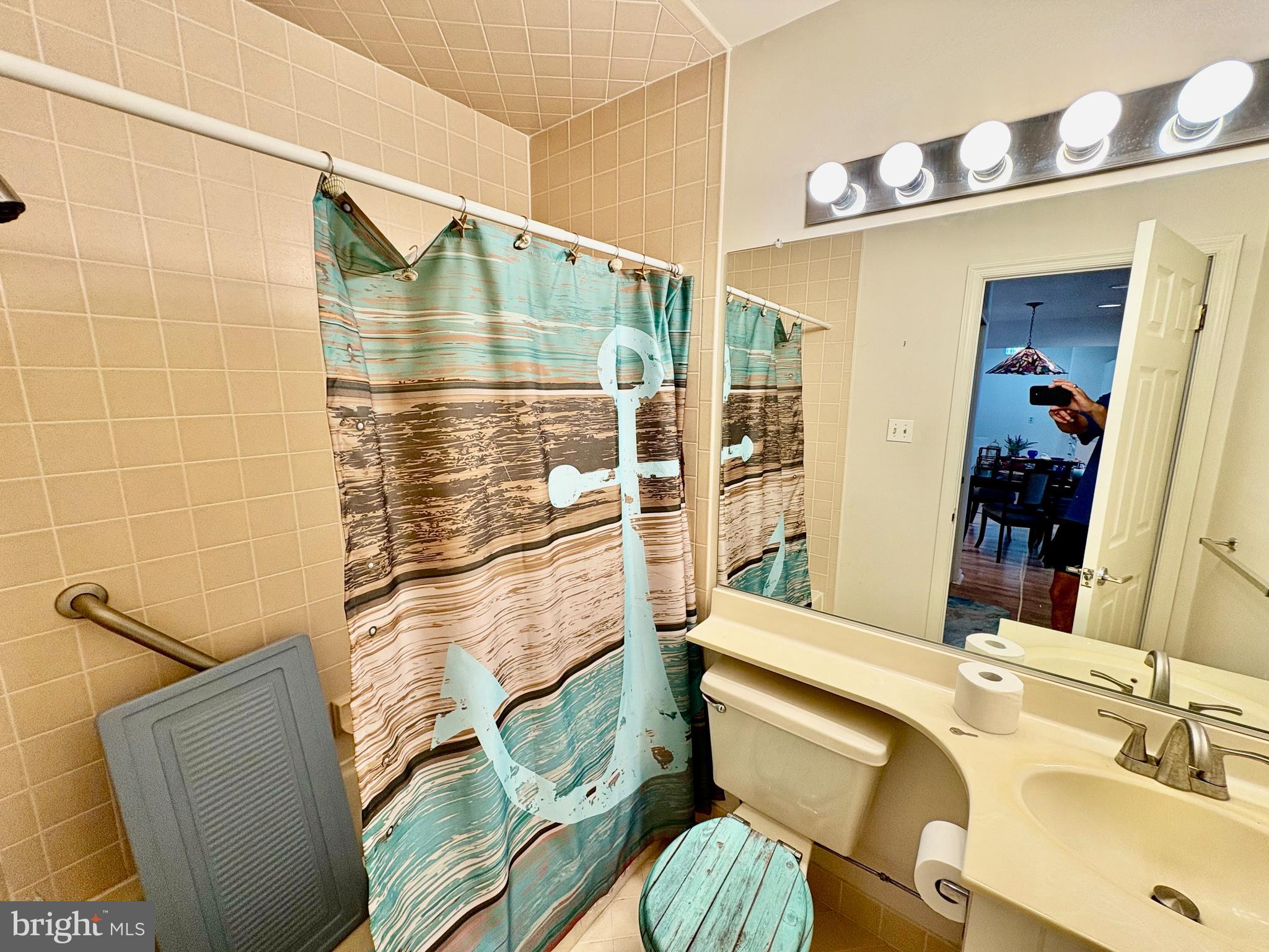 550 Central Avenue Linwood, NJ 08221 - Photo 10 of 13 a bathroom with a sink toilet and shower