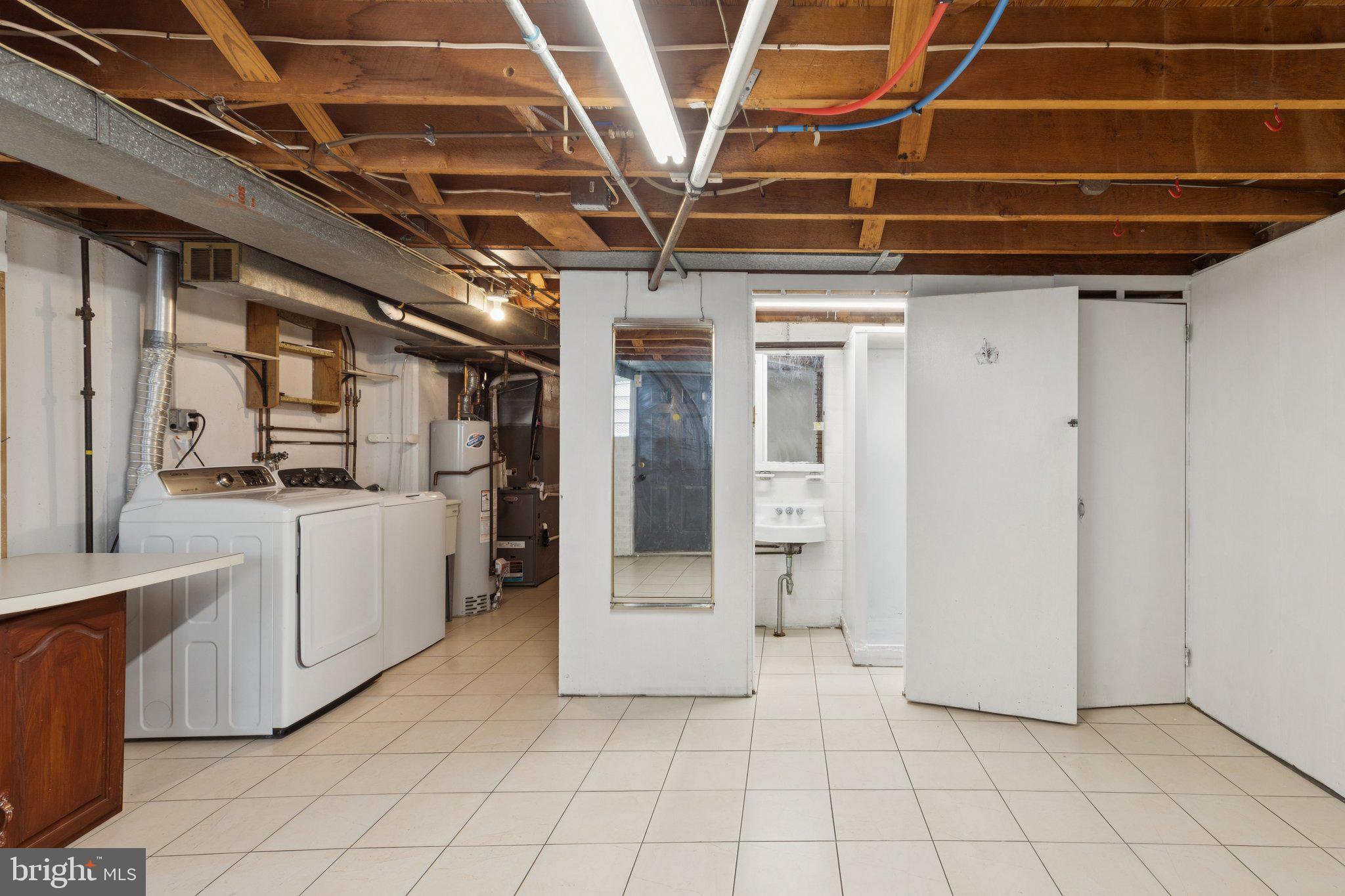 730 Millwood Road Philadelphia, PA 19115 - Photo 29 of 52 a view of open kitchen with a sink and cabinets