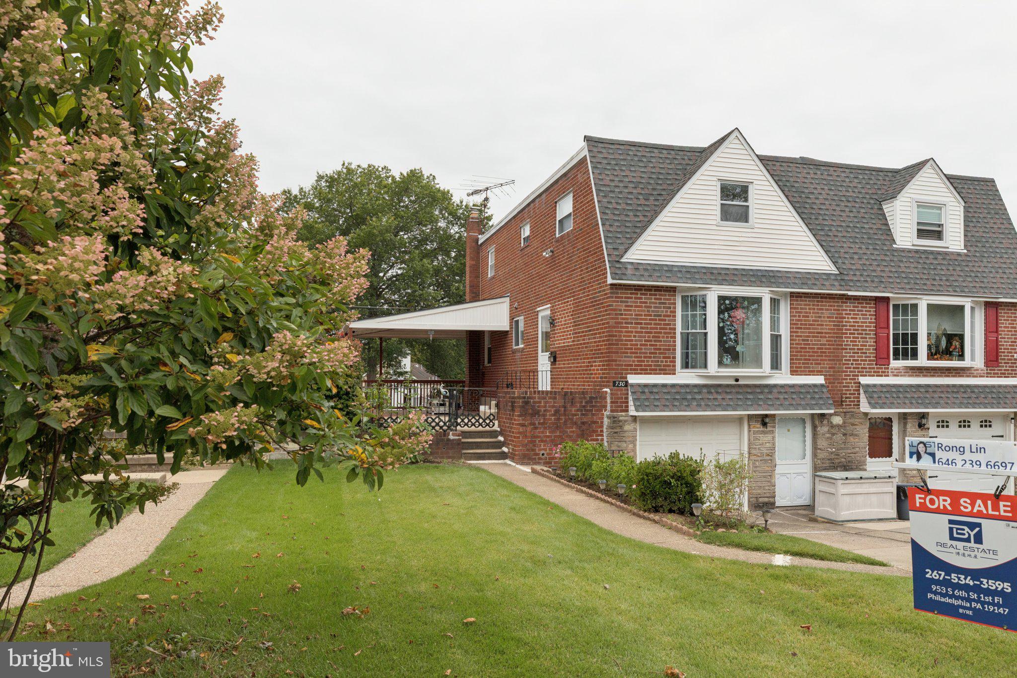 730 Millwood Road Philadelphia, PA 19115 - Photo 4 of 52 a front view of house with yard and outdoor seating
