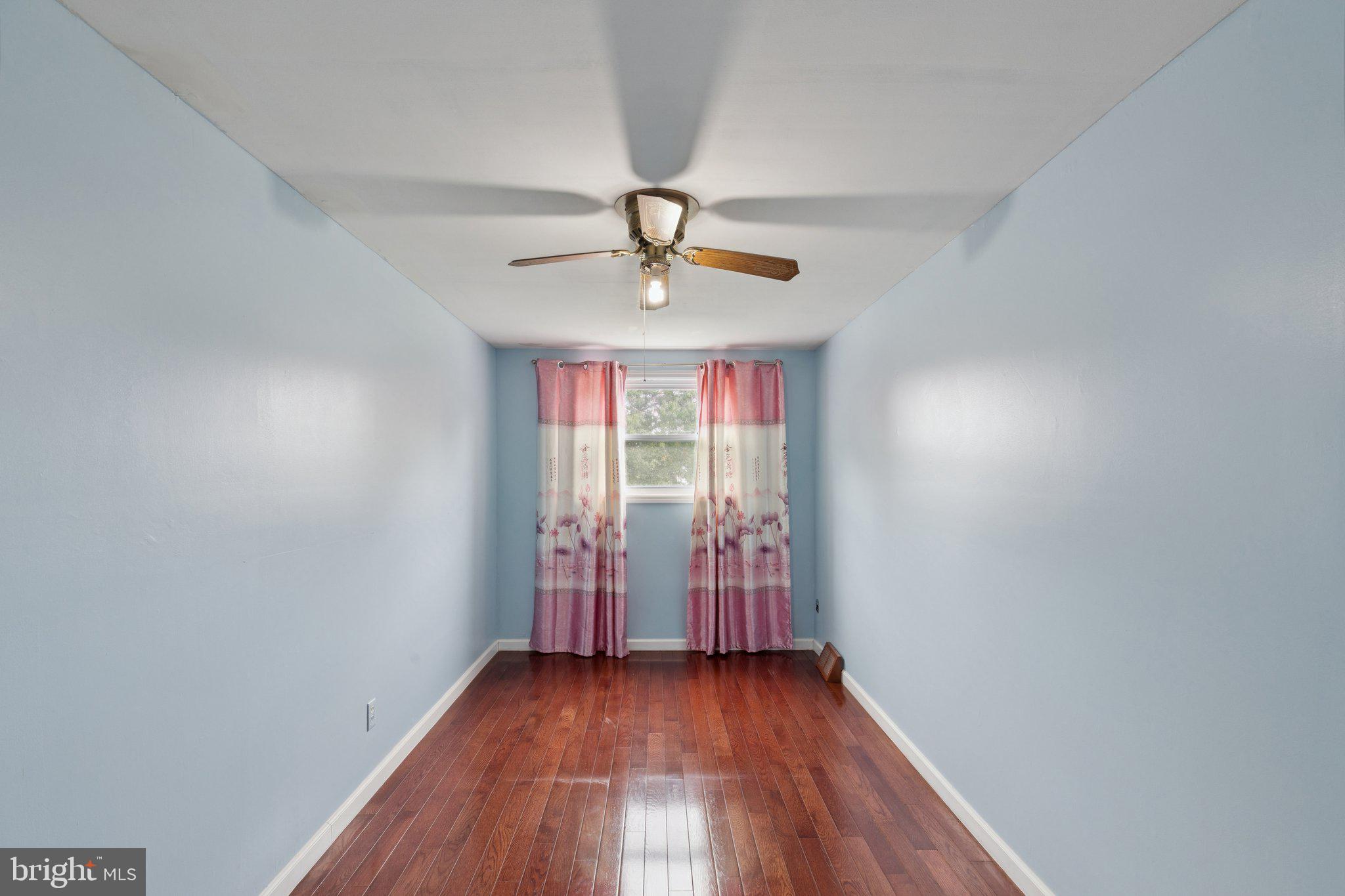 730 Millwood Road Philadelphia, PA 19115 - Photo 44 of 52 wooden floor in an empty room with a window