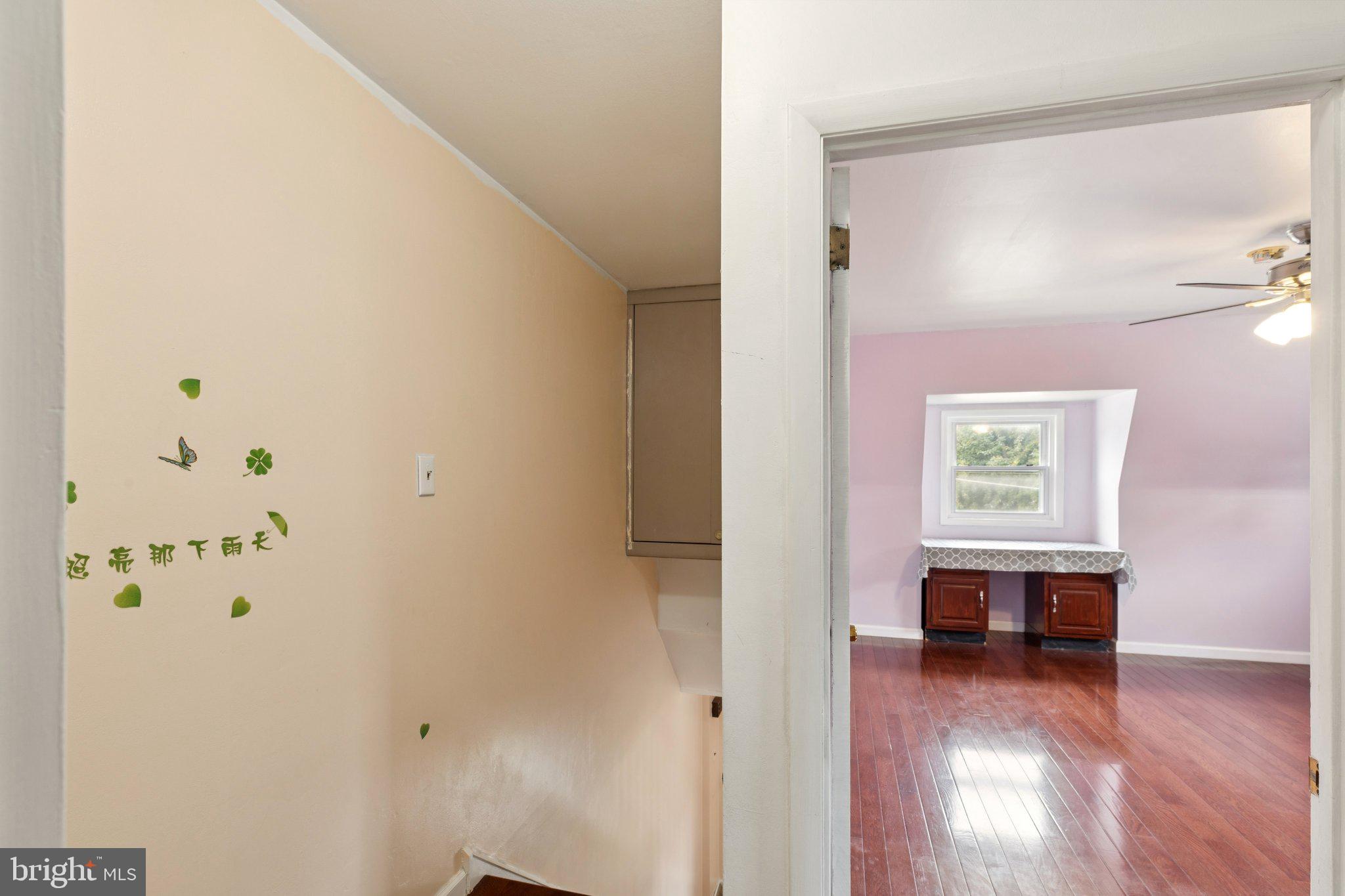730 Millwood Road Philadelphia, PA 19115 - Photo 46 of 52 a view of kitchen and hallway with wooden floor