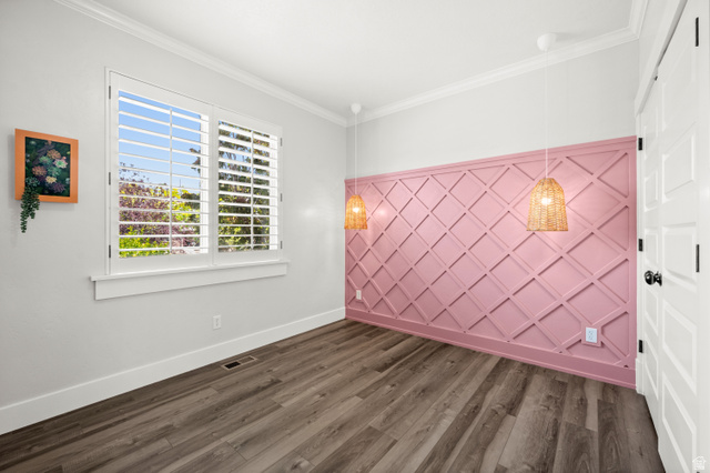 4077 Rons Court Riverton, UT 84096 - Photo 24 of 48 With its custom feature wall and decorative lighting, this room is ready to become a favorite retreat, creative space, or bedroom.