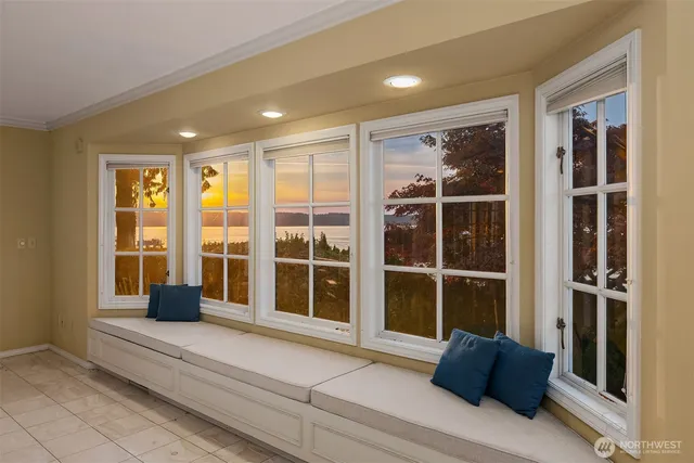 a view of a entryway with a couch and front door