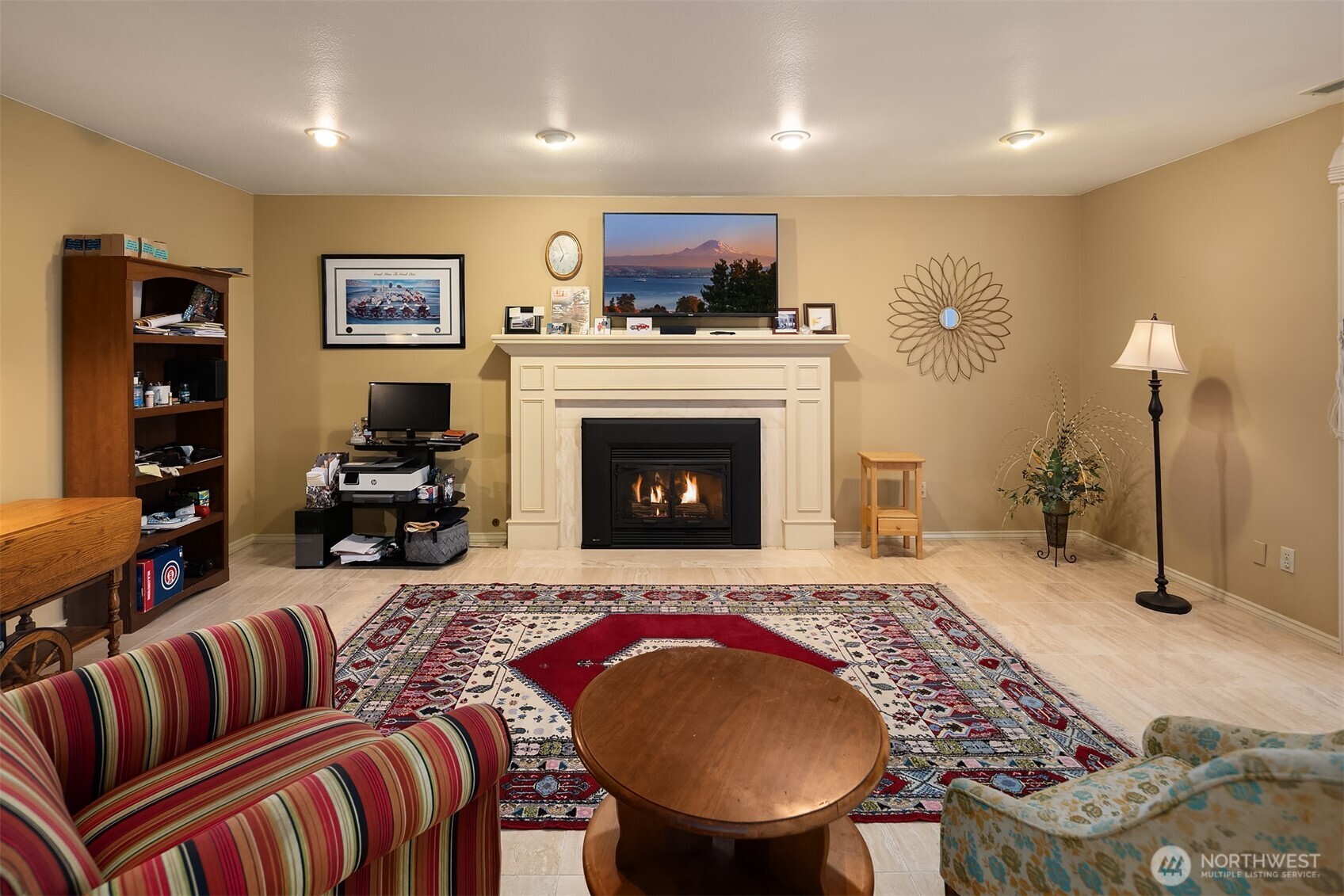 3727 Shore Avenue Everett, WA 98203 - Photo 32 of 40 a living room with furniture and a fireplace