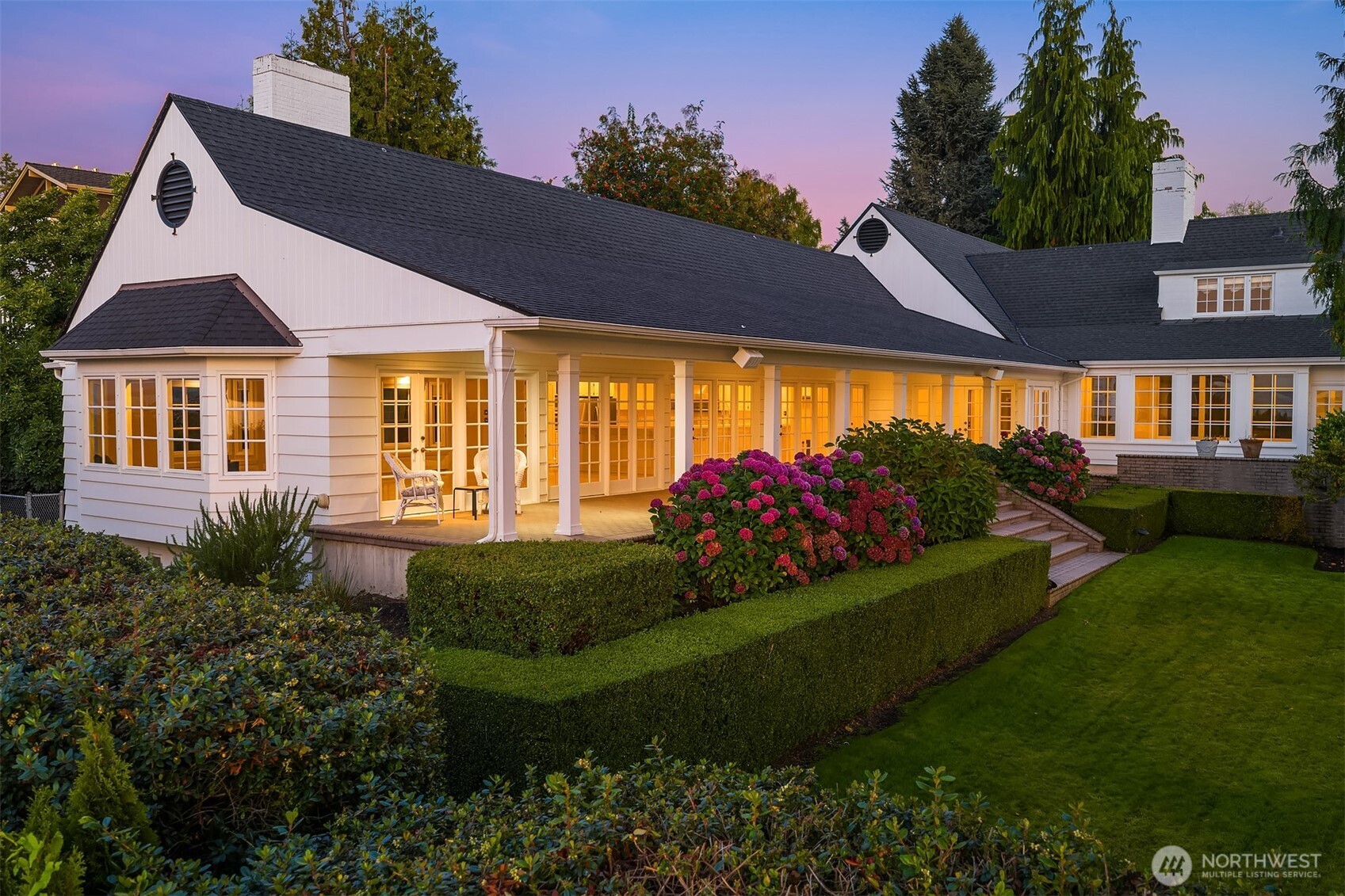 3727 Shore Avenue Everett, WA 98203 - Photo 9 of 40 a front view of a house with a garden