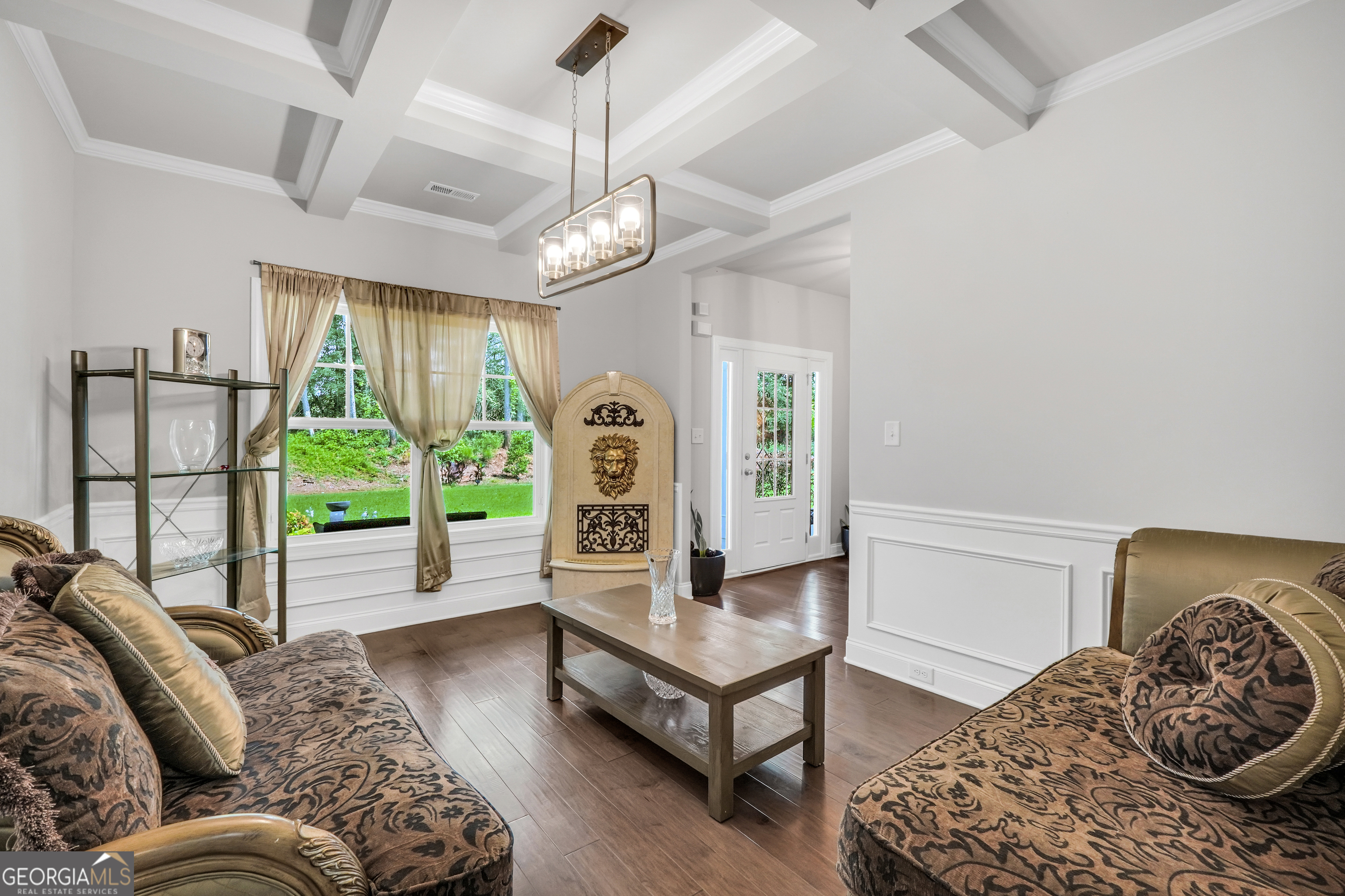 800 Rock House Road Senoia, GA 30276 - Photo 3 of 23 a bedroom with furniture and a large window