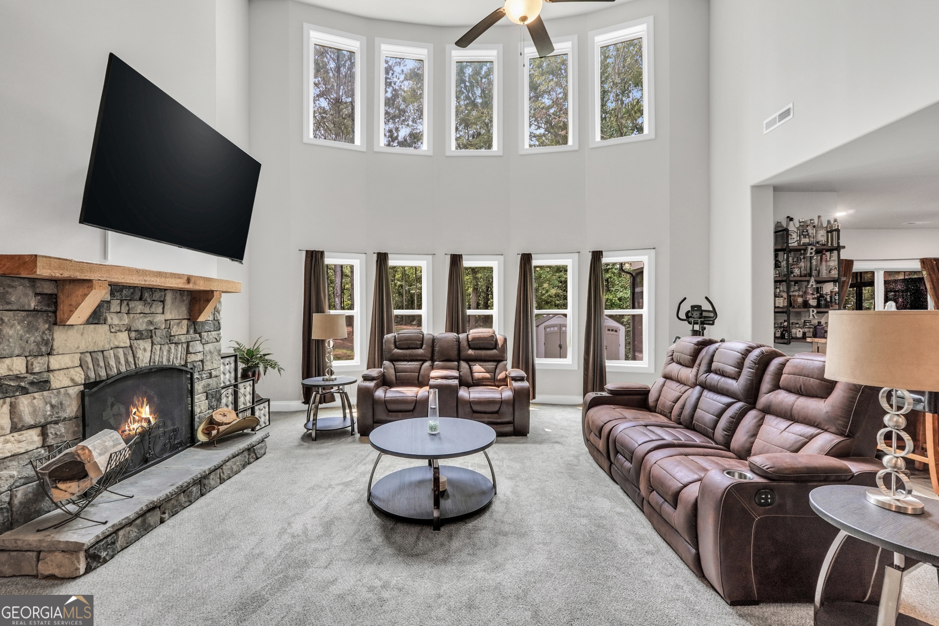 800 Rock House Road Senoia, GA 30276 - Photo 8 of 23 a living room with furniture fireplace and flat screen tv