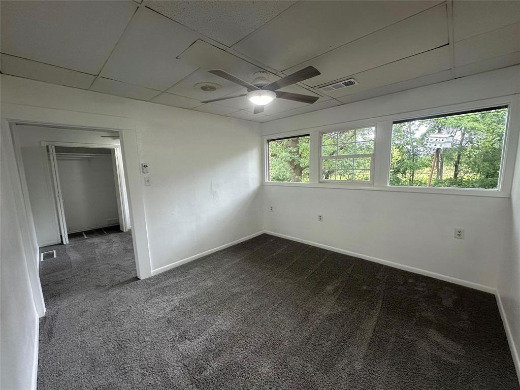 4723 North Loy Lake Road Sherman, TX 75092 - Photo 11 of 16 an empty room with windows