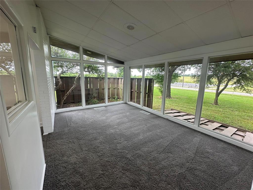 4723 North Loy Lake Road Sherman, TX 75092 - Photo 12 of 16 a view of an empty room with a large window