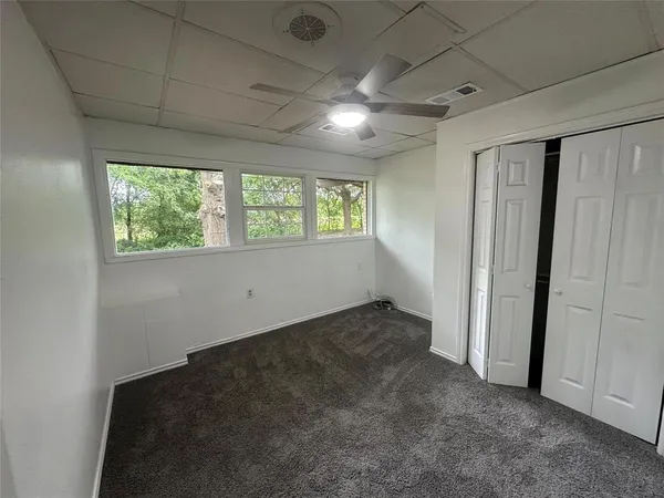 an empty room with windows