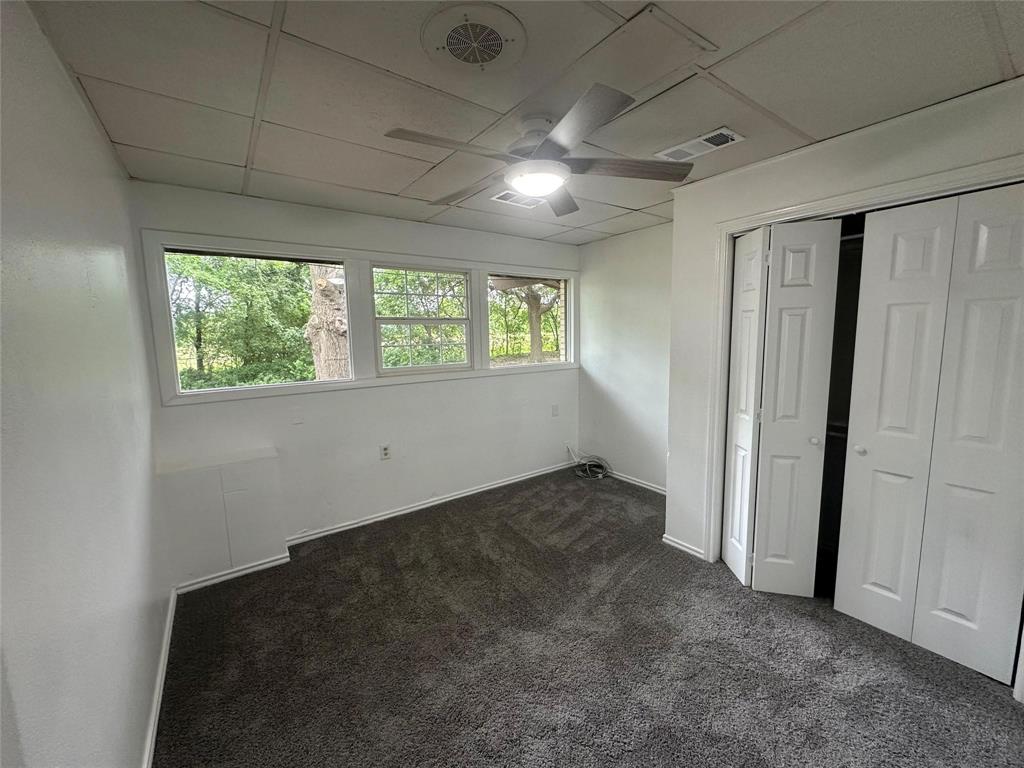 4723 North Loy Lake Road Sherman, TX 75092 - Photo 5 of 16 an empty room with windows
