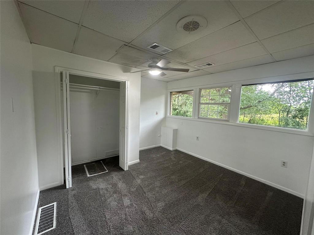 4723 North Loy Lake Road Sherman, TX 75092 - Photo 7 of 16 a view of an empty room with a window
