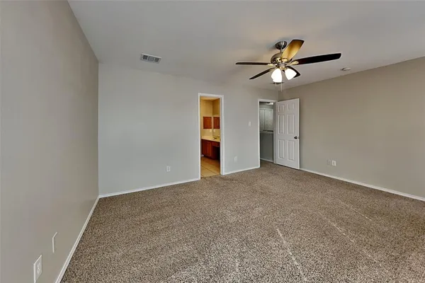 a view of a big room with carpet